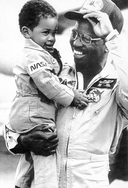 McNair and his son, Reginald, in the early 1980s.