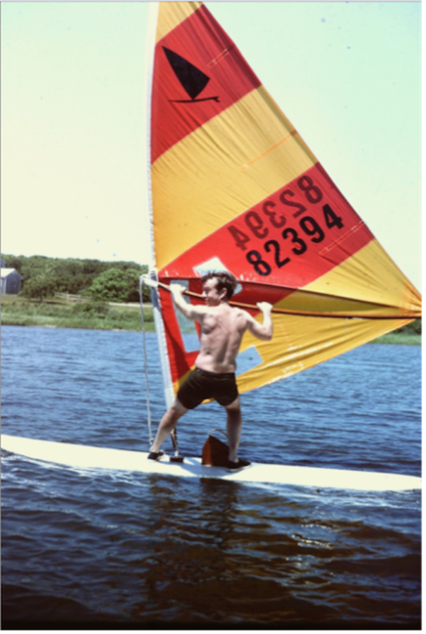 man windsurfing