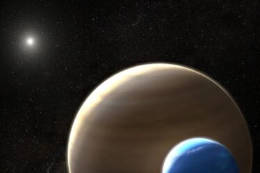 An illustration of a large moon circling a gas-giant planet around a distant star.